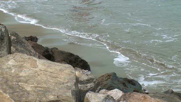 Waves Hit A Quiet Beach