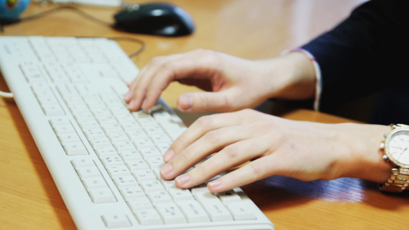 Fingers Typing On The Keyboard alt