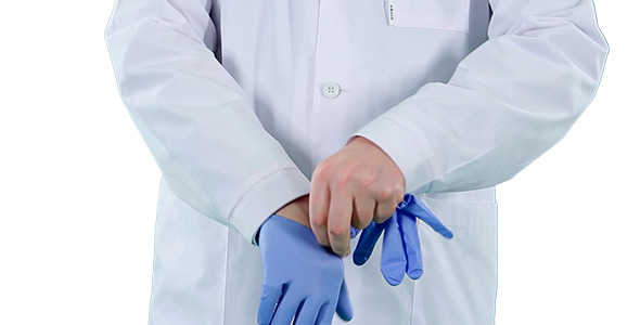 Doctor Putting On Gloves