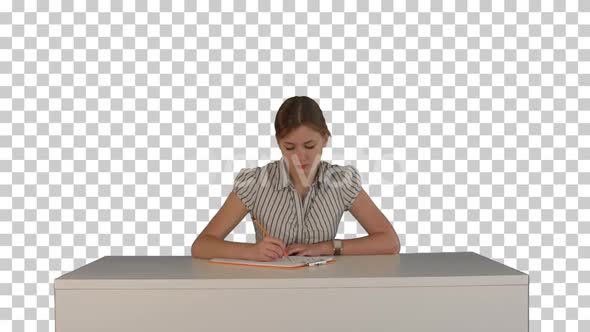 Young girl sitting in classroom at lecture, Alpha Channel