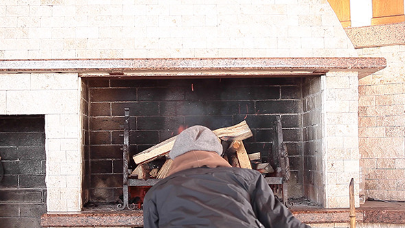 Man Blowing Barbecue BBQ alt