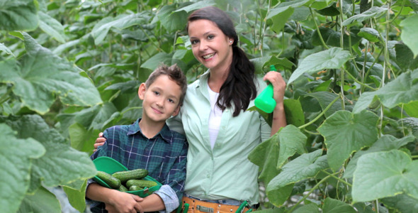 Farmers of woman and boy alt