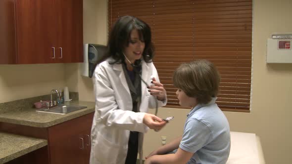 Female Doctor Begins Pediatric Checkup