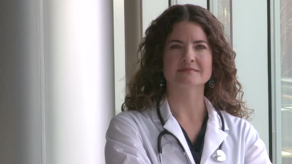Female Doctor Turns To The Camera And Looks Confident (1 Of 2)
