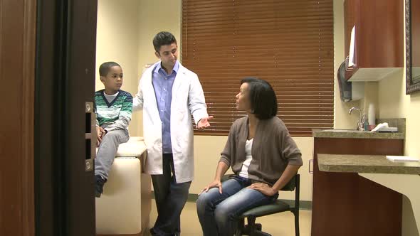 Doctor Diagnoses A Young Boy (3 Of 10)