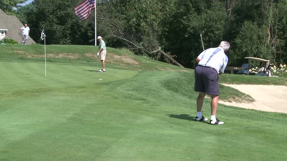 Golfer Chipping Onto Green (2 Of 2)
