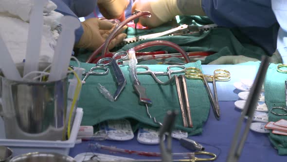 Surgical Table With Operation In Background