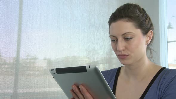 Young Woman On Tablet Computer (4 Of 4)