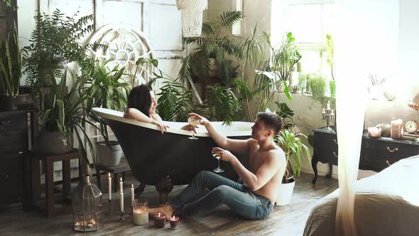Young couple spending time together in their beautiful house alt