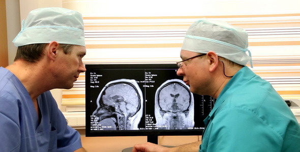 Maure Doctors Examining CT Scan