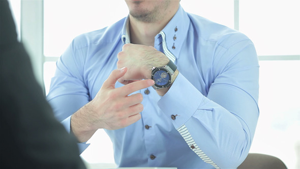 Two Successful Businessman Sitting At The Table alt