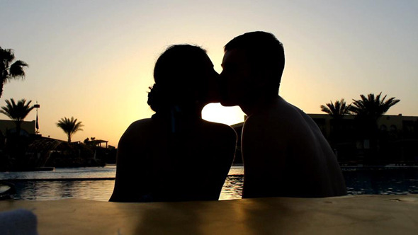 Lovers Kissing at Sunset