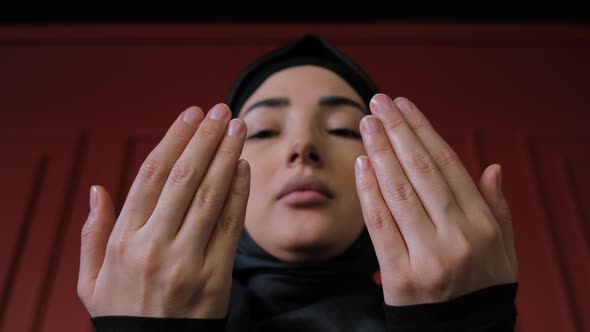 Young Muslim Woman in Hijab Praying Namaz