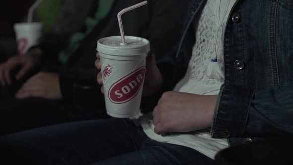 Drinking A Soda At The Movies