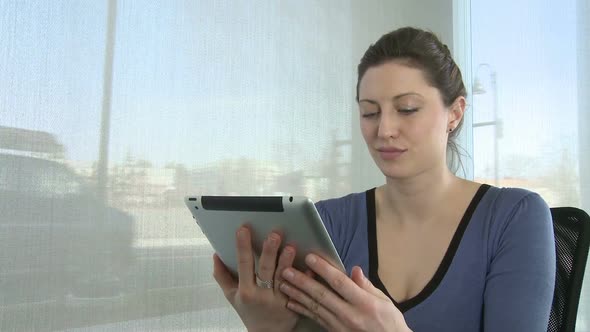 Young Woman On Tablet Computer (2 Of 4)