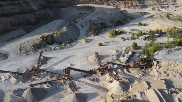 Aerial view opencast mining limestone quarry.
