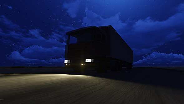 Trucker Goes On Night Road