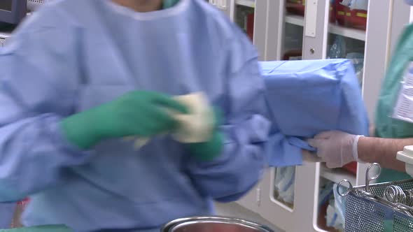 Medical Staff Removing Gloves