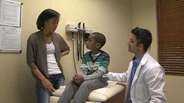 Doctor Diagnoses A Young Boy (9 Of 10)