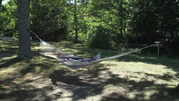 Man Relaxing On A Hammock (3 Of 3)