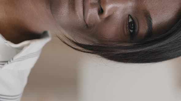 Vertical View Headshot Half Human Female Face with Dark Eyes Happy African American Woman Smiling alt