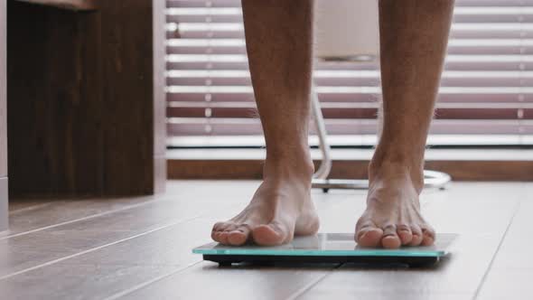 Closeup Male Legs Slender Thin Sporty Unrecognizable Guy Male Athlete Standing at Home Bathroom alt