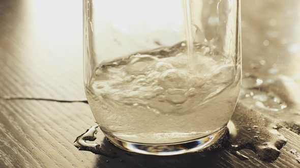 Pouring Mineral Water In The Glass