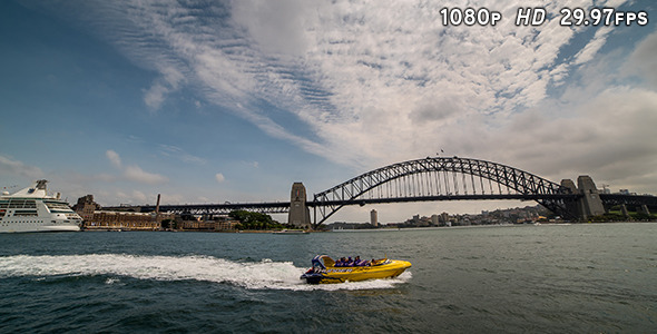 Boats passing Sydney Harbour Bridge