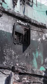Vertical Video of a Destroyed Residential Building in Ukraine During the War alt