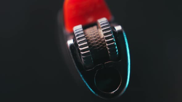 Lighter on a Dark Background Rotates in Macro alt