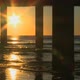 View Of Sunrise Through Pier Moorings - VideoHive Item for Sale