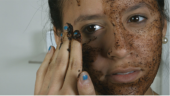 Girl Applying Cosmetic Face Mask
