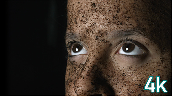 Girl Looking Up with Cosmetic Mask alt