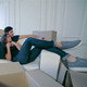 Couple In Love Lying On Sofa Among Boxes - VideoHive Item for Sale