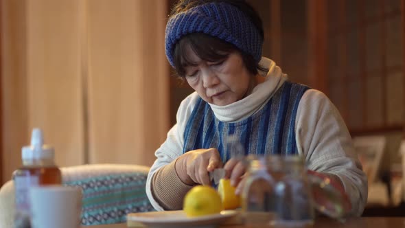 Woman making honey pickled lemon alt