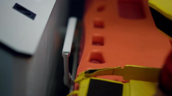 EMS Paramedics Hands Getting Ready Medical Equipment for Injuring Patient alt