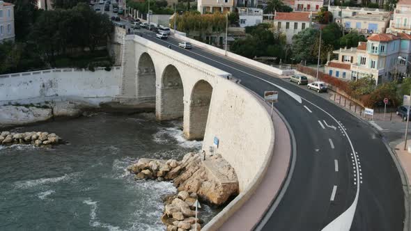 Long Exposure Time-Lapse Shot Of Traffic On The Bend In The Corniche Road, Marseilles alt