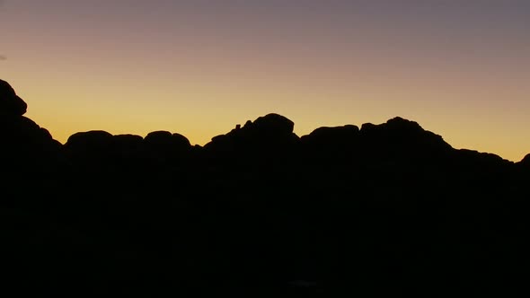 Sunset Fading Over Rocks - Clip 1 alt