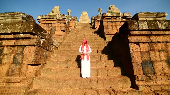 Female Buddhist Slowly Walking Down Temple Steps With Incense -  Angkor Wat Temple Cambodia 3