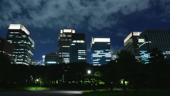 Downtown Tokyo Business District At Night With Clouds 1