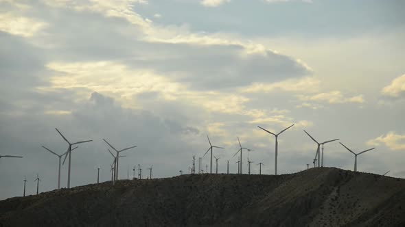 Power Windmills In The California Desert At Sunset 12