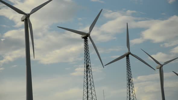 Power Windmills In The California Desert At Sunset 13