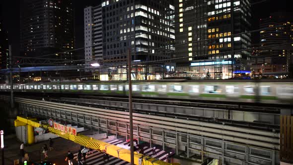Train Passing Over Bridge In Central Tokyo Japan At Night 1