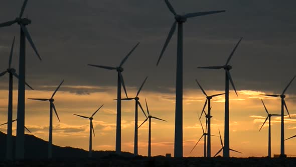Power Windmills In The California Desert At Sunset 15