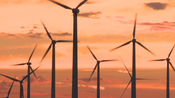 Power Windmills In The California Desert At Sunset 9