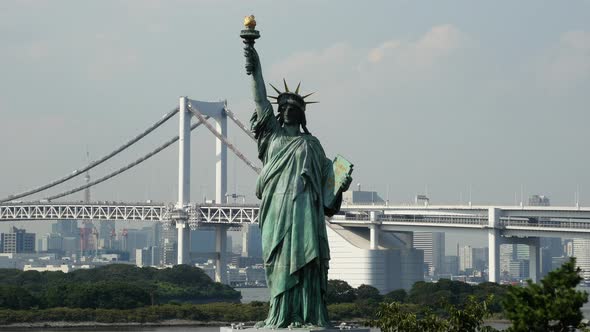 Replica Statue Of Liberty With Peace Bridge In The Background  -  Tokyo Japan 2
