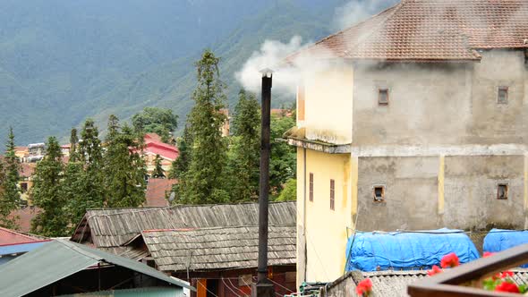 Sapa Vietnam  - Smoke Rises From Vent On A Rooftop 1