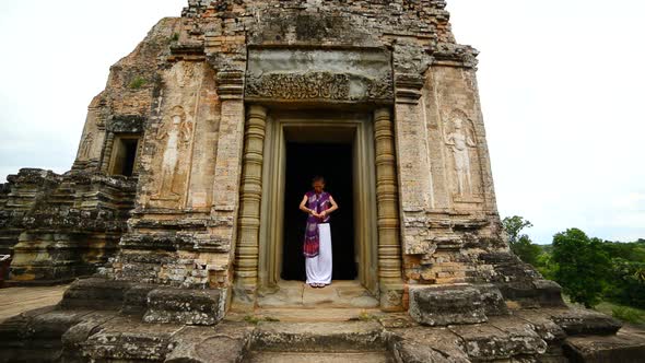 Female Buddhist Praying With Incense In Temple Doorway -   Angkor Wat Temple Cambodia 3