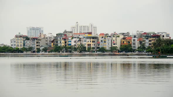 Hanoi Vietnam - Colorful Apartment Buildings On A Scenic Lake