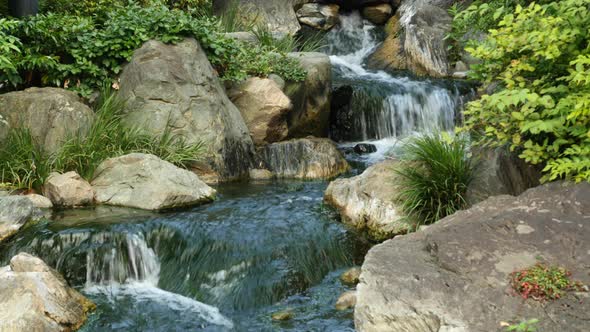 Waterfall Runs Into A Koi Pond At Sensoji Temple Tokyo Japan 2